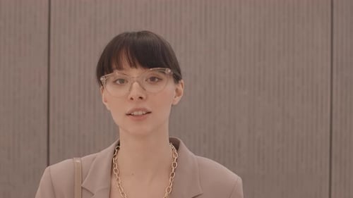 Stylish Woman Talking In Close-Up Indoor Shot