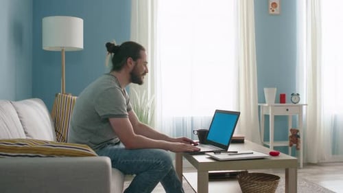 Man Is Talking Via Laptop with Chroma Key