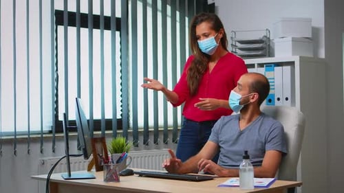 Office Colleagues Collaborating with Face Masks