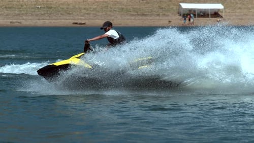Man riding personal water craft on lake, super slow motion, shot on Phantom Flex 4K