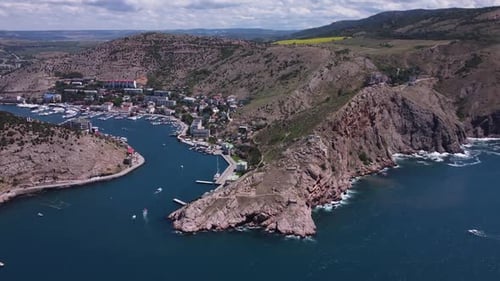 Aerial View of the Landscape with a Pier for Yachts and Boats on the Mediterranean Strait Between