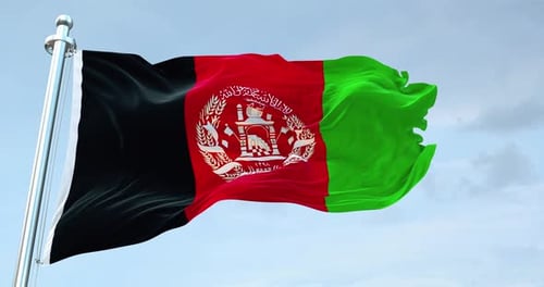 Realistic Waving Flag of Afghanistan Against Blue Sky
