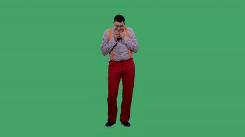 Worried Man Clasping Hands on Green Screen