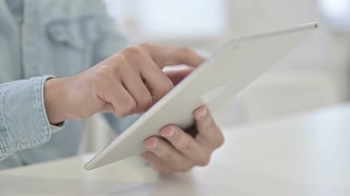 Hands Using Tablet Device for Communication