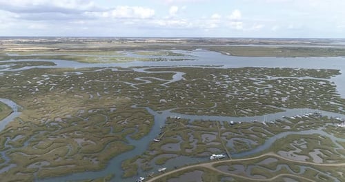 Left to right aerial pan over Tollesbury Marina
