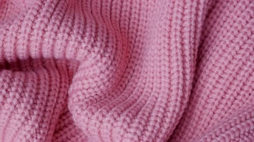 Close Up of Elegant Pink Knitted Material