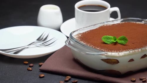 Tiramisu Dessert with Coffee and Mint Garnish