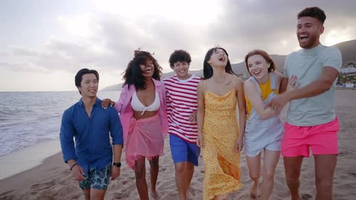 Group of friends having fun on the beach.