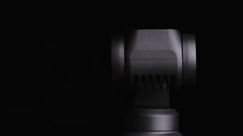 Rotating Camera Gimbal on a Black Background