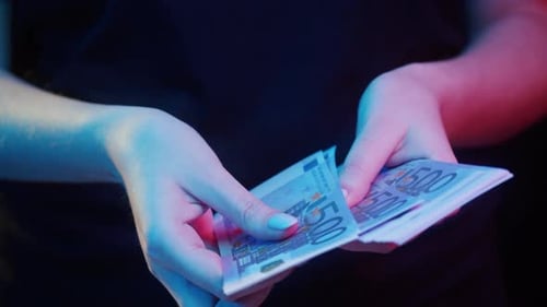Businessman Counting Money Rich Person Holding a Stack of 500 Euro in Hands