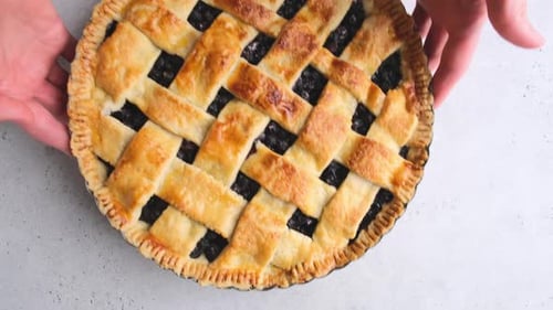 Homemade blueberry pie, top view.