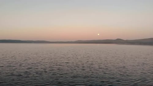 Flying Over the Lake at Dawn