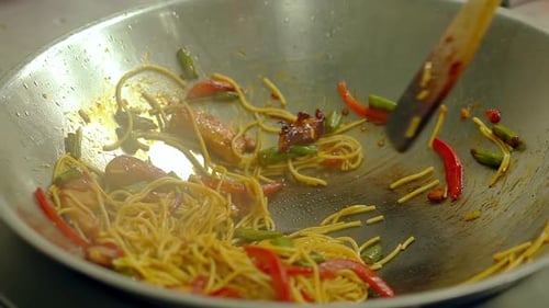 Noodles and Vegetables Stir Fried in Wok