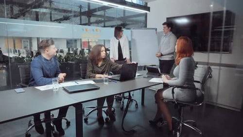 Multiethnic Business Team Having Meeting in Office