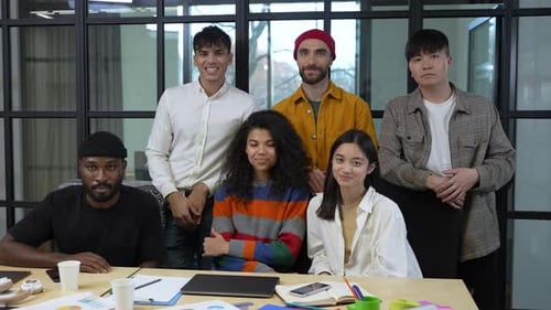 Multiethnic Coworkers Posing for Camera in Office