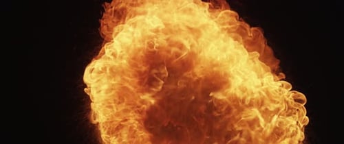 Intense Fire Flames Erupting on Black Background