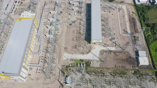 Aerial view of electricity generating, voltage poles. Power lines on utility tower and cable wires
