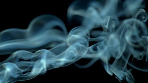 Abstract Blue Smoke Against Black Background