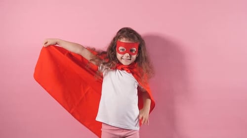 Happy Child Posing in Superhero Costume