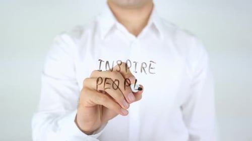 Man Writes "Inspire People"