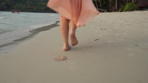 Close up leg of young woman walks barefoot on sand on the Beach.Travel Summer vacations concepts