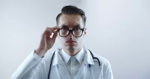 Surprised Doctor in White Coat and Glasses
