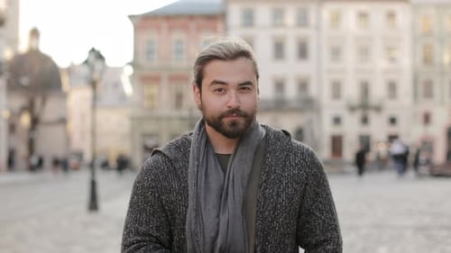Man Poses in Urban Setting