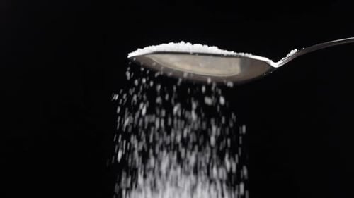 sprinkle sugar from a spoon