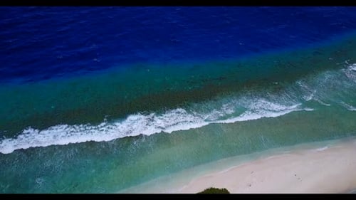 Aerial drone shot tourism of paradise seashore beach adventure by transparent lagoon and white sand