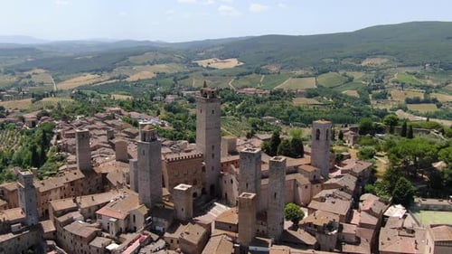 Flying over San Gimignano hill town in Tuscany, Italy, Europe