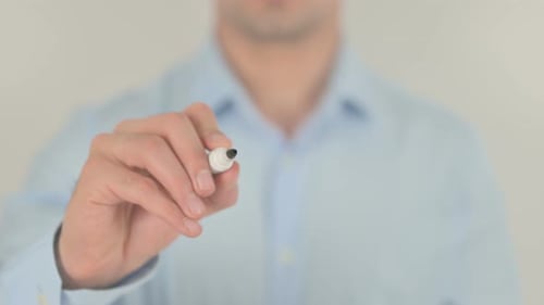 Man Writes "SOLD" on Transparent Screen, Close Up