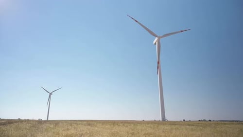 Wind Turbines Generating Clean Energy in Rural Field