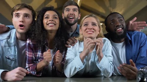 Friends Cheering Together Watching Sports Game