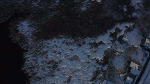 Aerial View of Snowy Landscape in Winter