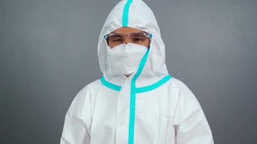 Person in a White Full Body Hazmat Suit