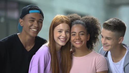 Sweet Multiethnic School Kids Hugging and Smiling at Camera, Childish Friendship