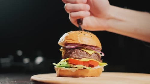 Close-Up of Delicious Burger with Knife