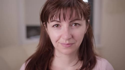 Portrait of a Happy Woman Looking at the Camera Close Up Moving Camera
