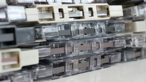 Pile of Vintage Audio Cassette Tapes Close-Up