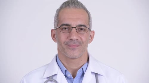 Smiling Male Doctor in White Coat Close Up