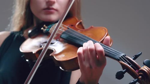 Girl Violin Playing at Studio, Woman Is Practicing Playing Musical Instrument
