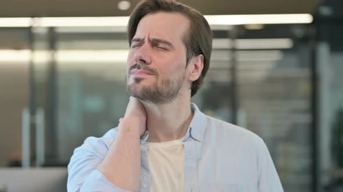Tired Man Having Neck Pain