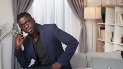 Professional Man Talking on Phone Indoors