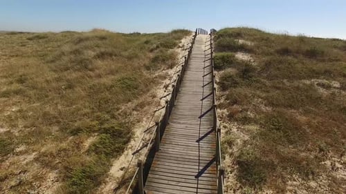 Walkway To The Beach Over Dunes