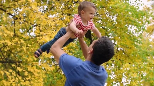 Daddy Playing With Little Son