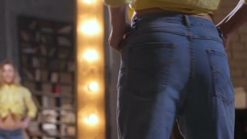 Woman Shows Loose Jeans After Weight Loss