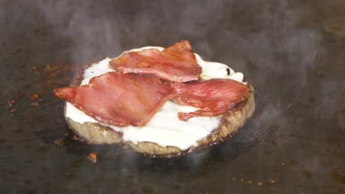 Burger Patty with Cheese and Bacon Cooking