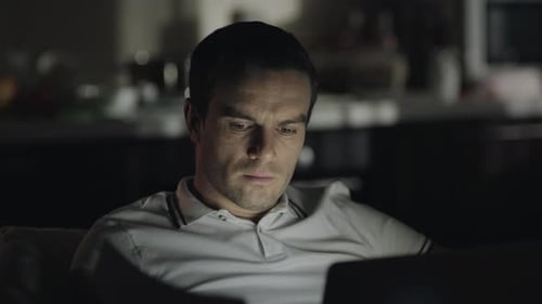 Serious Business Man Working Night at Remote Workplace.