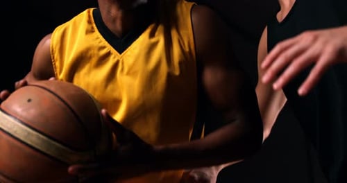 Sportsmen playing basketball
