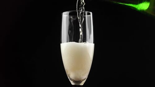 Champagne. One Flute with Sparkling Wine. Celebrating. Glass of champagne close up.